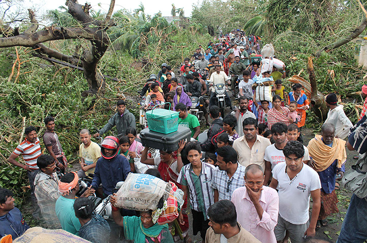 Cyclone Phailin damage: People return from cyclone shelters to their villages in Odisha state