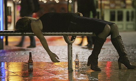 Woman lies on bench after leaving bar