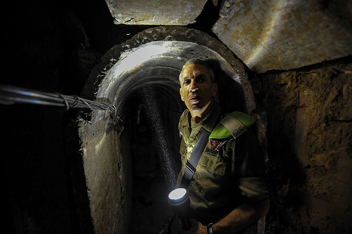Gaza tunnels: Israeli Brigadier General Micky Edelstien shows the inside of a tunnel near