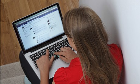 Young girl using laptop 