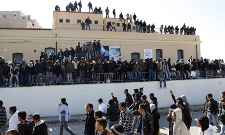 Migrants from North Africa arrive in Lampedusa