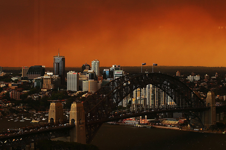 Australia fires: Sydney Harbour Bridge and North Sydney CBD shrouded in smoke haze