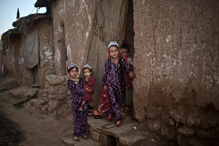 Muhammed Muheisen's Eid: Afghan refugee girls celebrate the first day of Eid al-Adha