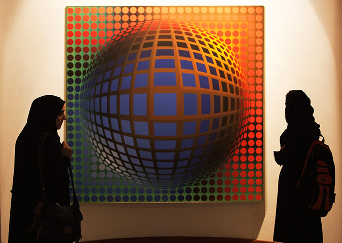 Iran Tourism Push: Visitors look at an artwork by Victor Vasarely at Tehran's Museum of Contem