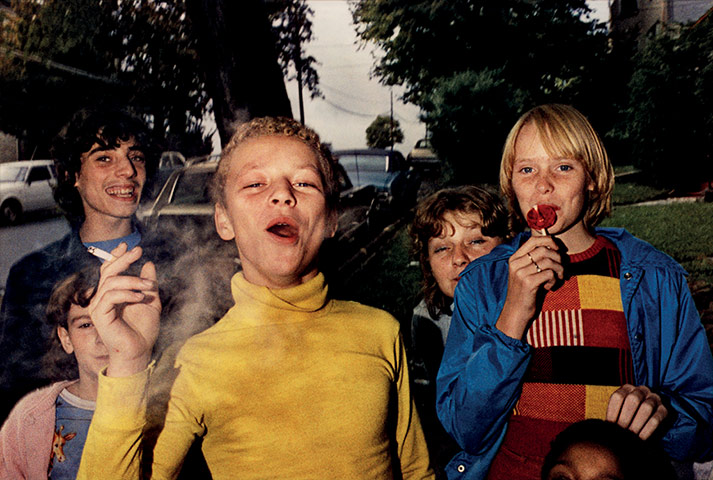 Mark Cohen: Boy in yellow shirt smoking
