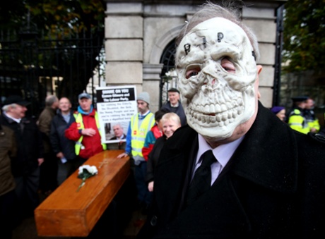 Michael McManus, from Portlaoise, during the protest by pensioners, outside Leinster House, Dublin, in reaction to Budget 2014.
