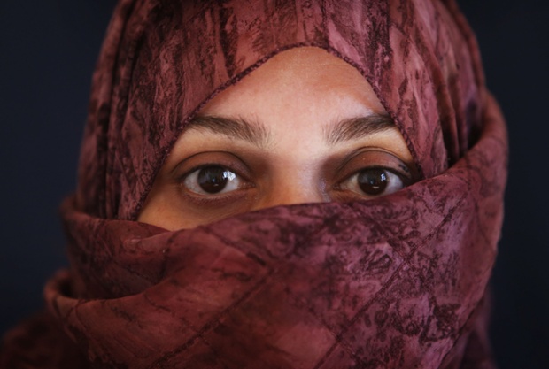 Hanady Rakhan is the mother of a three-year-old child who was deafened in a bomb blast during the Syrian conflict. This photograph was taken in her current home in the Badawi refugee camp in Lebanon.