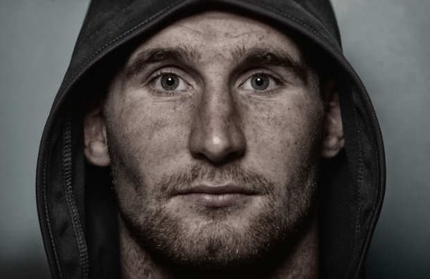 This portrait of rugby league player Sam Tomkins was taken during the England press conference ahead of the Rugby League World Cup in Loughborough, England. The photographer has used a digital filter giving the subject a gritty quality.