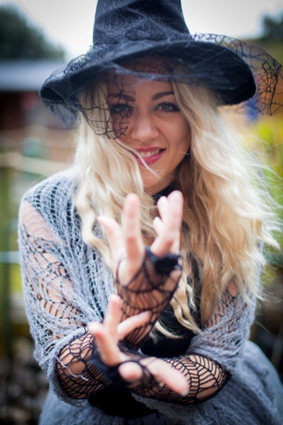 Charlotte Perrett does her witchy thing for the camera as she waits to audition for the role of resident witch at the Wookey Hole Caves tourist attraction in Somerset, England.