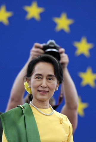 The photographer must be hoping for an alternative portrait of Burmese opposition leader Aung San Suu Kyi arriving at the European Parliament in Strasbourg where she is due to receive the Sakharov human rights prize she won in 1990 at the height of the Burmese military crackdown.