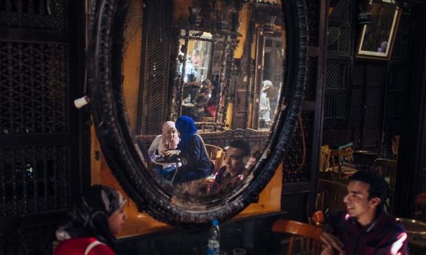 This is a cleverly candid portrait using the mirror in the Al-Fishawy Cafe in Cairo, Egypt, to focus on the subjects.