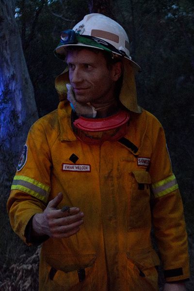 Bushfires Weds: A firefighter holds a gecko