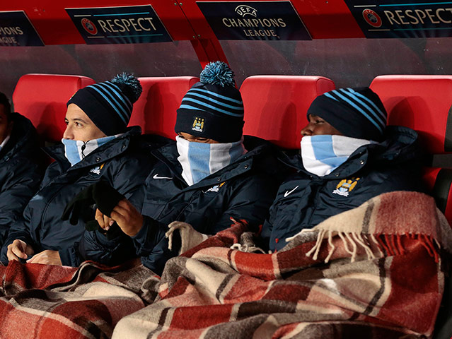 citah: Manchester City subs wear scarves