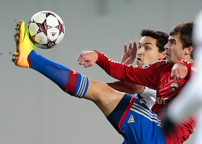 citah: Georgi Milanov and Jesus Navas battle for the ball