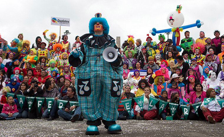 From the agencies: Clowns: Mexican clown Llantom stands in front of hundreds of clowns for group photo