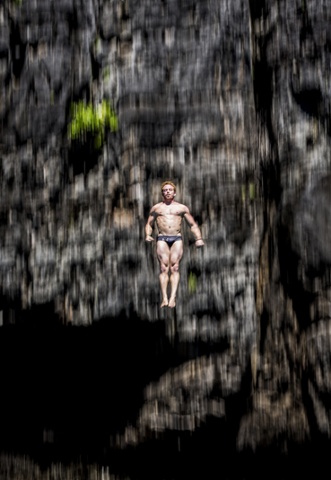Alain Kohl of Luxembourg is brilliantly caught on camera in mid-dive from the 27-metre platform at Maya Bay during the 2013 Cliff Diving World Series on Phi Phi Island in Thailand.