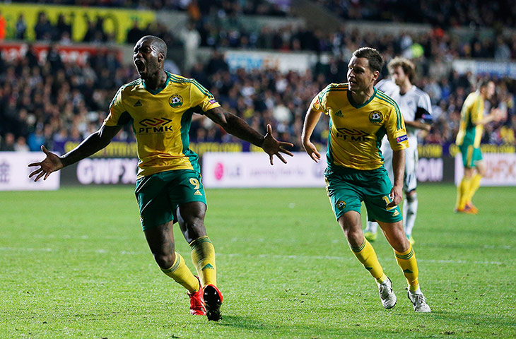Wigan: Djibril Cisse celebrates