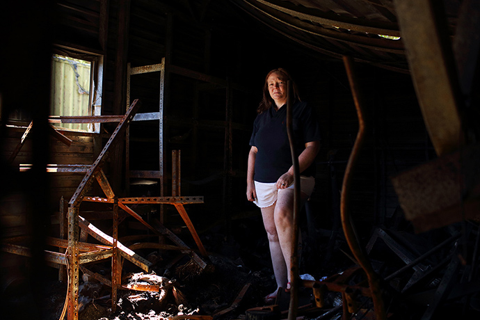 Bushfires : The burnt-out inside of Michelle Smith's shed on Sunny Ridge Road, Winmalee