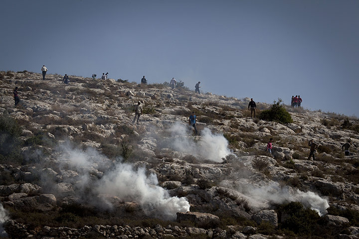 20 Photos: Palestinian residents clash with Israeli forces in Bilin near Ramallah