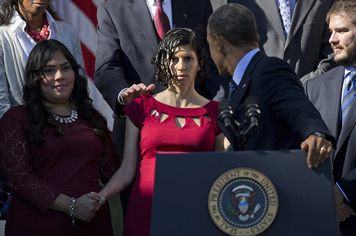 20 Photos: President Barack Obama looks at Karmel Allison of San Diego