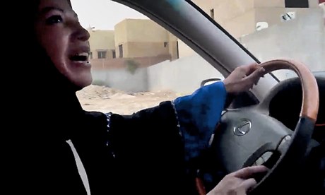 A woman drives a car in Saudi Arabia 