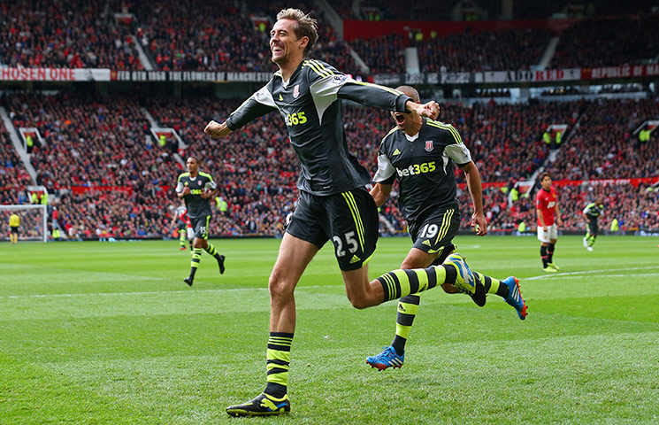 Premier League 2: Peter Crouch of Stoke City celebrates after scoring the opening goal