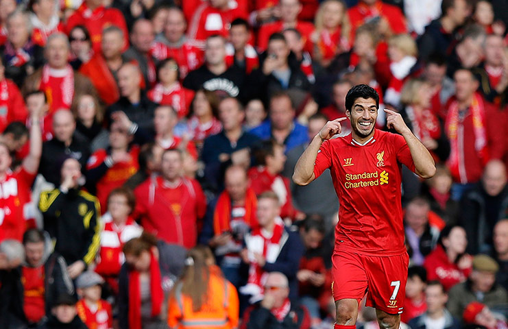 Premier League 3: Luis Suarez celebrates after scoring Liverpool's second goal