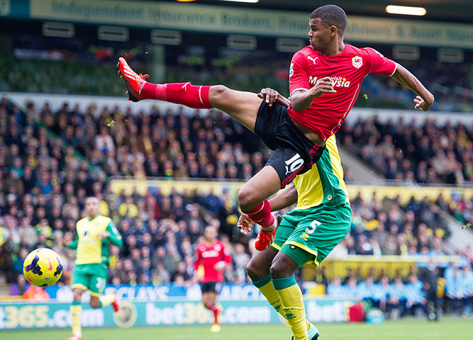 Premier League 3: Cardiff's Fraizer Campbell has a shot on goal against Norwich