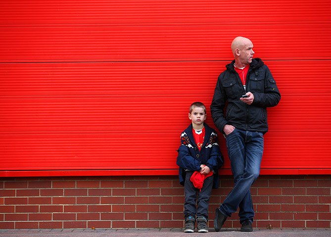 Premier League 5: Football fans wait outside the stadium ahead of  the match between Southamp