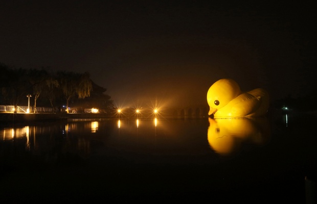 The artwork Rubber Duck, designed by Dutch conceptual artist Florentijn Hofman, is uninstalled at the Summer Palace in Beijing, China after nearly two-months on display in the city.