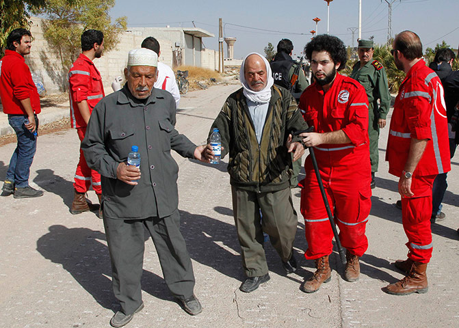 Volunteers help older man