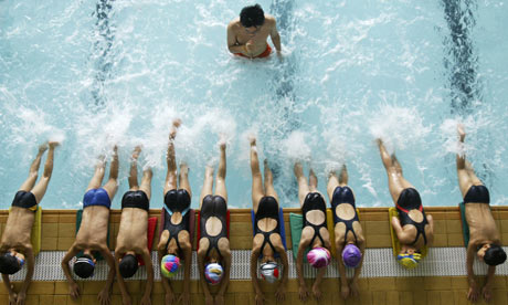 Children exercise at swimming pool in Shanghai
