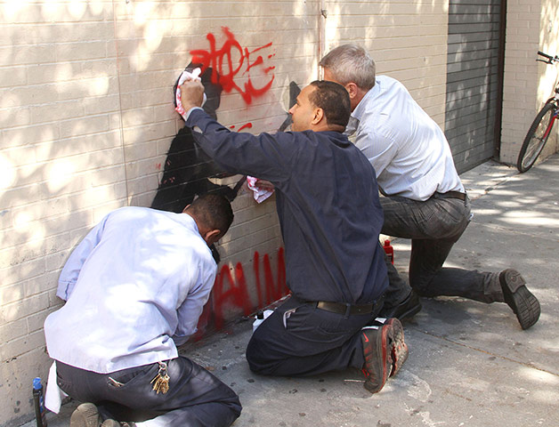 Banksy in NYC update: Work defaced with 'Let the Streets Decide'