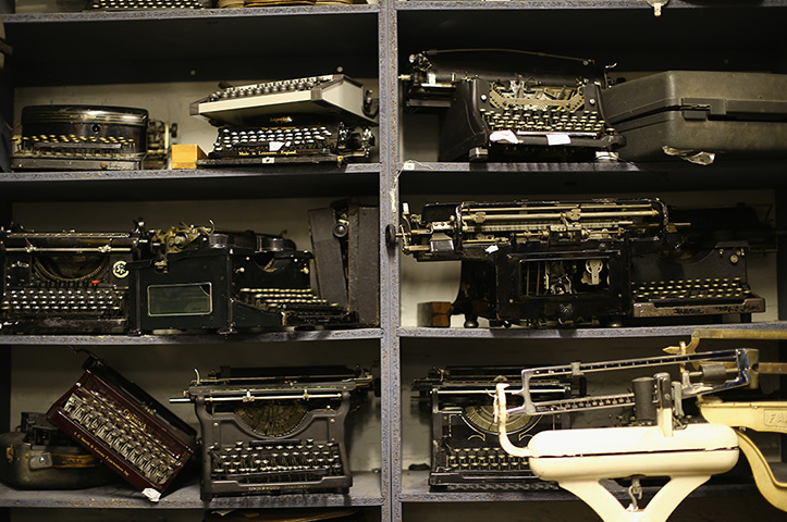 National Theatre props: Old typewriters sit on a shelf. All of the props and costumes have been pro