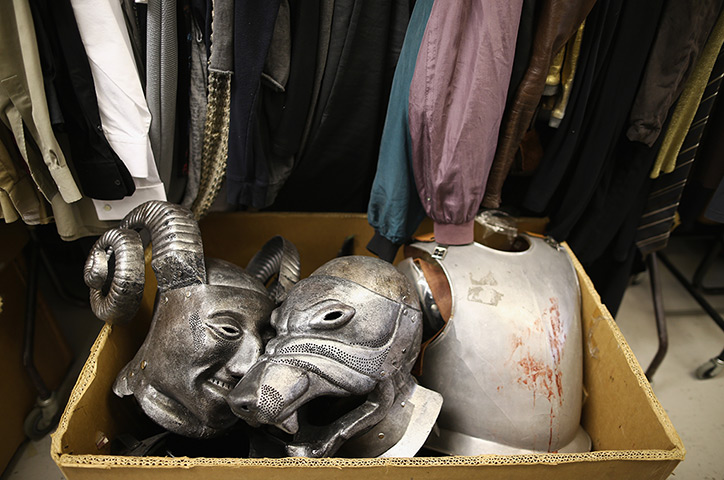 National Theatre props: Masks and armour sit in a box