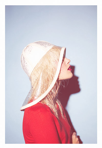Fashion Shoot Colour: red knitted jumper see through brim rain hat