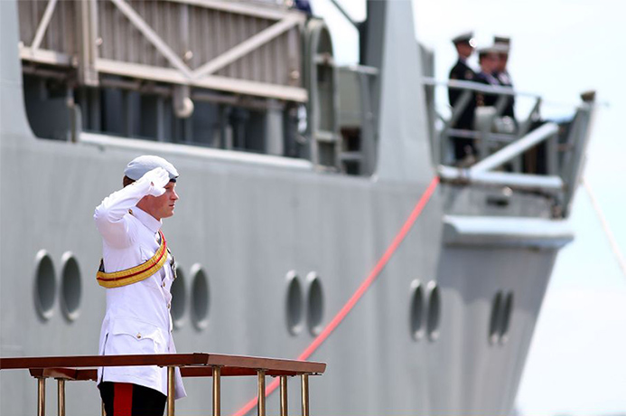 Fleet day three:  Prince Harry stands and salutes 