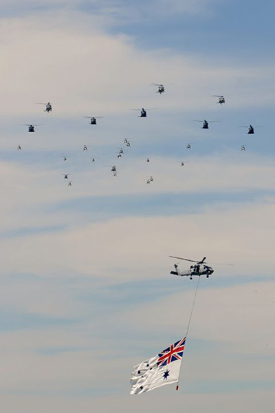 Fleet day three new: Helicopters fly in formation into the harbour