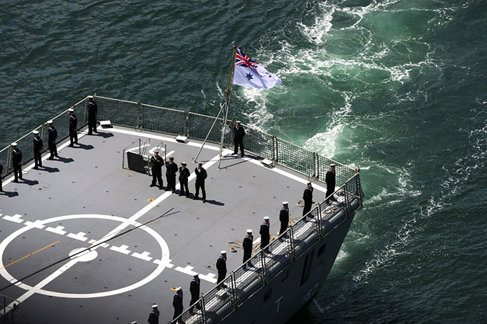 Fleet day three new: Crew stand to attention aboard a navy ship