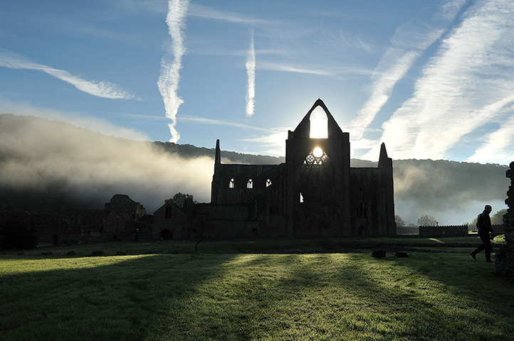 weekend in pictures: The sun rises behind Tintern Abbey in the Wye Valley 