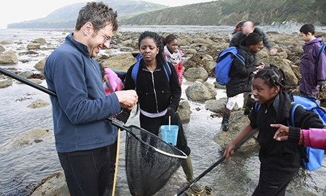 George Monbiot rockpooling with children from south-east london
