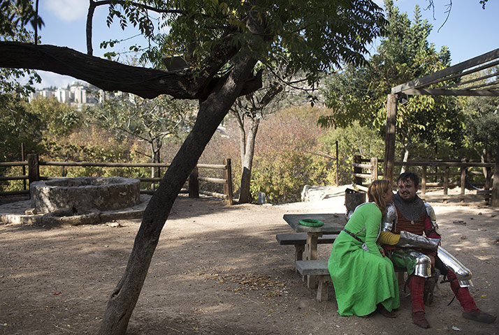 Knights of Jerusalem: A medieval history enthusiast sits with his girlfriend 