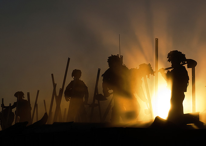 Army Photographic winners: Sappers from 21 Engineer Regiment working as the sun sets, to de-construct 