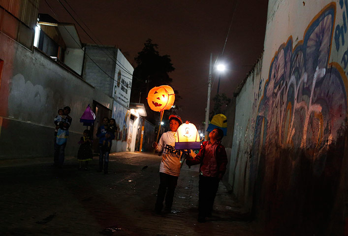 Day of the dead Children carry lanterns in Tultepec