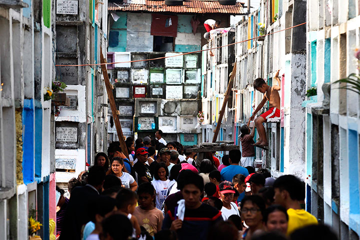 Day of the dead Millions of Filipinos troop to a local cemetery