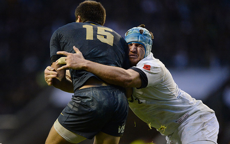 England v Argentina: Ben Morgan tackles Lucas Gonzalez Amorosino