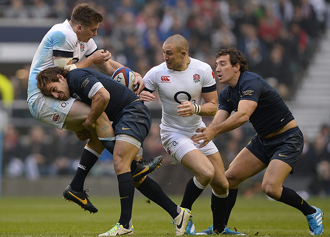 England v Argentina: Owen Farrell is tackled by Nicolas Sanchez