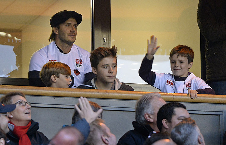 England v Argentina: David Beckham and his sons are in a box watching the match from a box 