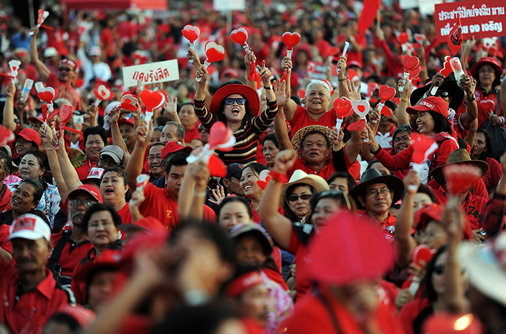 Weekend in pictures: Bangkok, Thailand: Red Shirts supporters wave clappers and shout slogans du