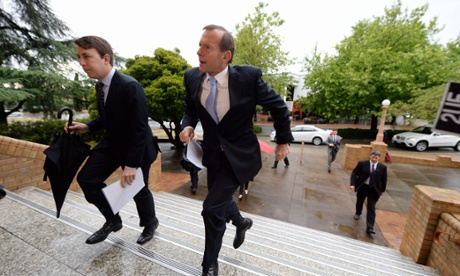 Lukas Coch captured Tony Abbott mid-flight as he arrived early this morning at the ecumenical service at St. Christopher's Cathedral in Canberra. Opposition leader Bill Shorten joined him.
